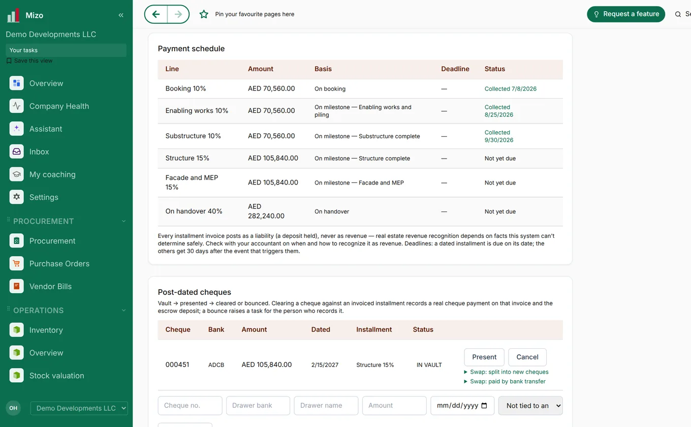 A buyer payment schedule with milestones and post-dated cheques